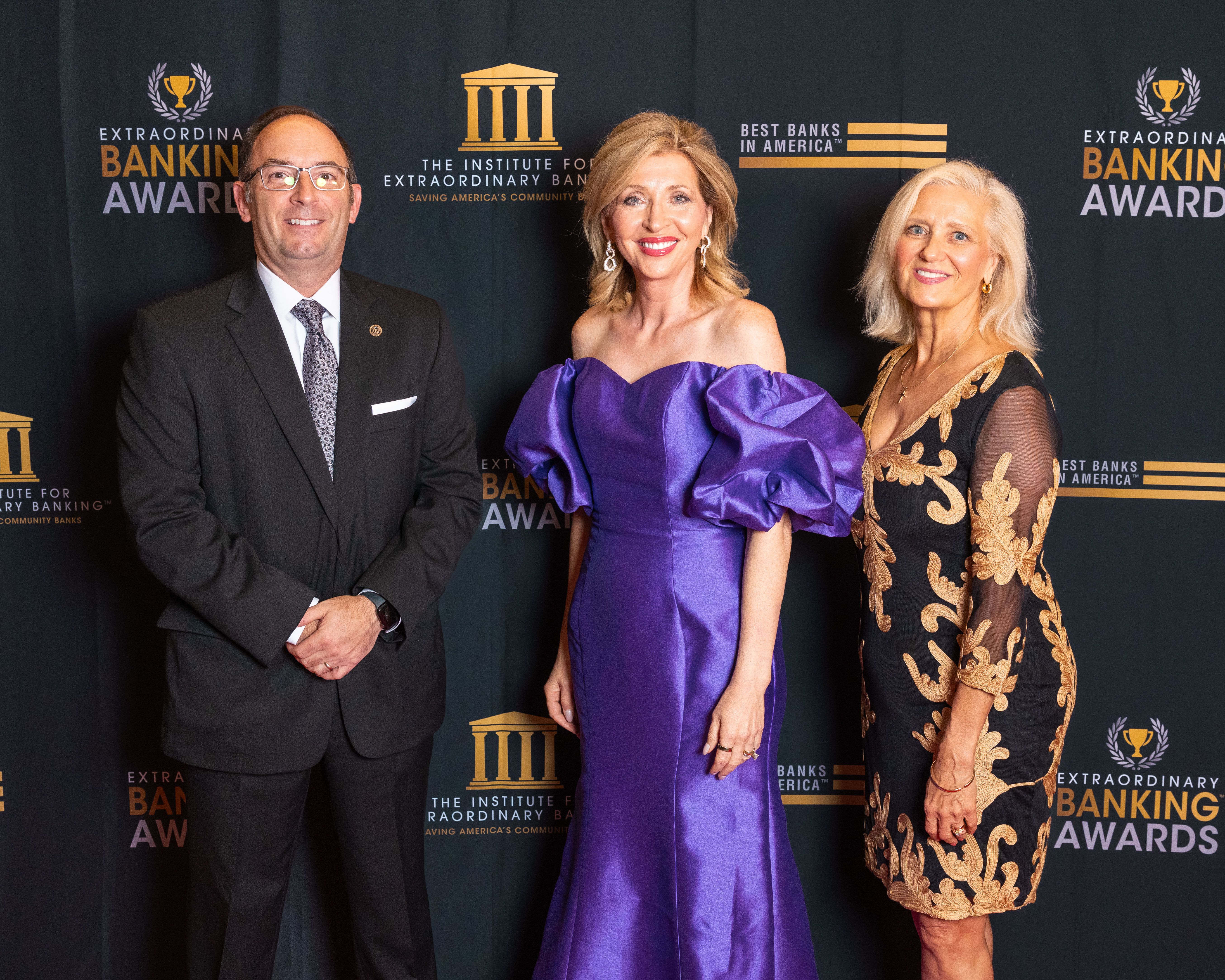 3 people receiving award