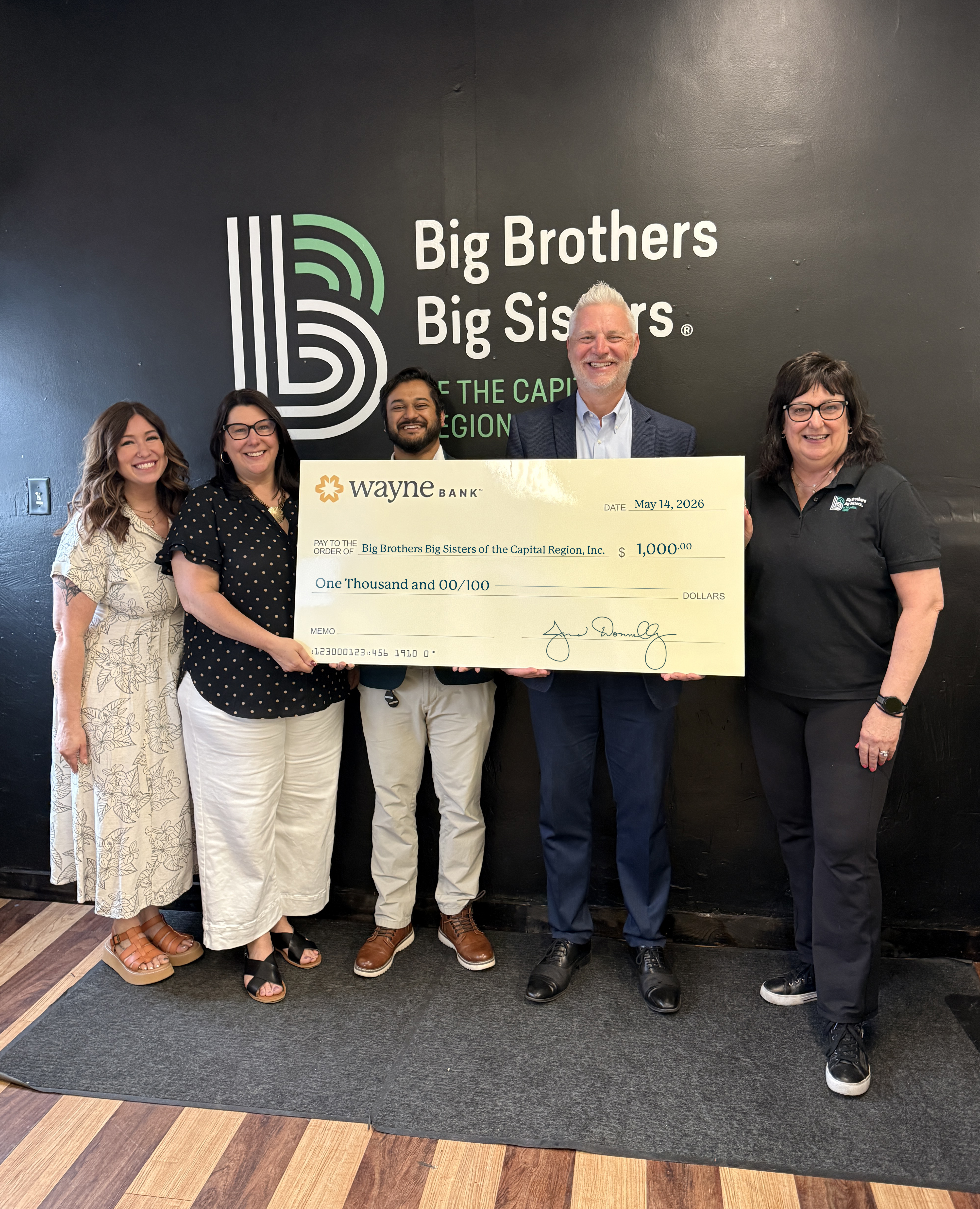 PHOTO CAPTION - LEFT TO RIGHT: Jose Colon, Commercial Team Lender, Wayne Bank; Doreen Broaddus, Cash Management Specialist, Wayne Bank; Liz Taylor, Donor and Partner Relations Coordinator, The Bridge Academy and Community Center; and Jordan Crans, Executive Director, The Bridge Academy and Community Center.  